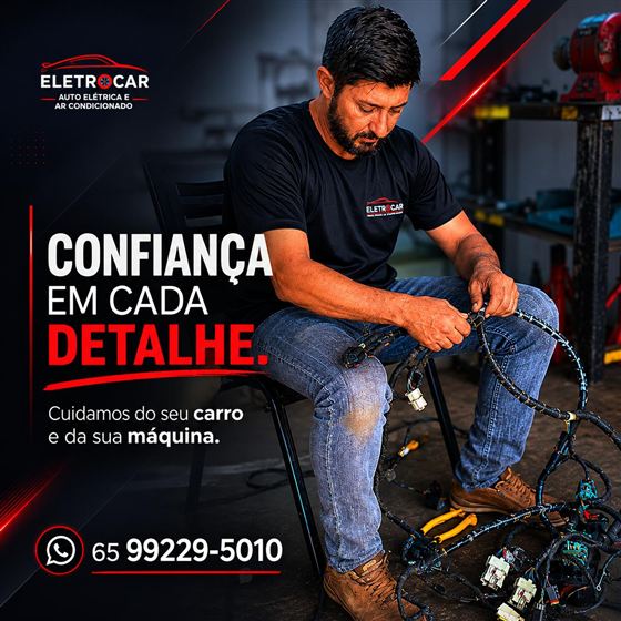 Profissional da Eletrocar revisando um chicote elétrico na oficina